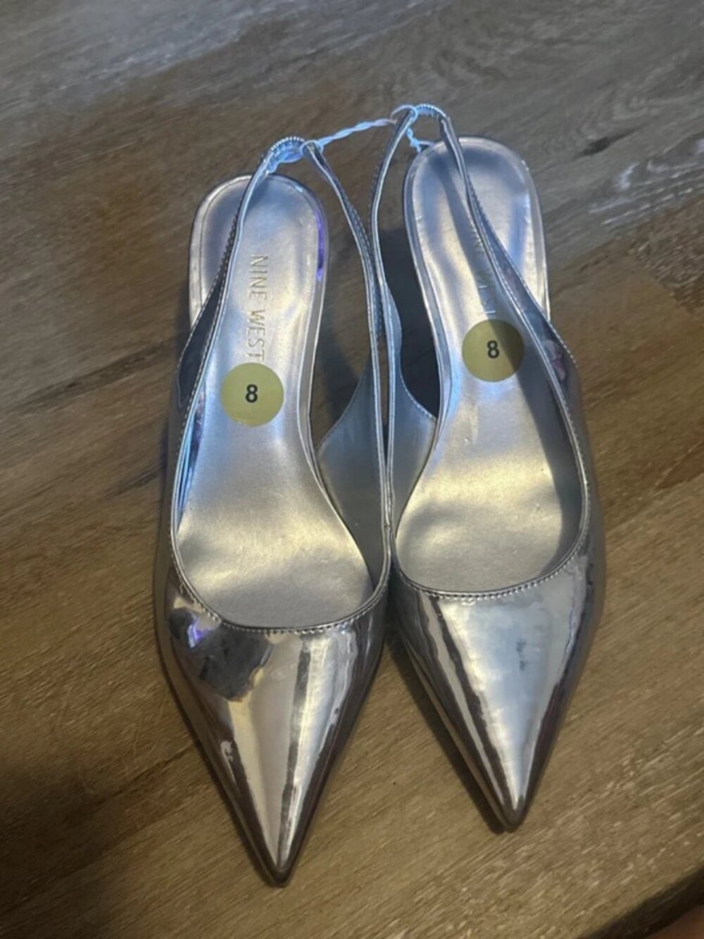 Nine West silver heels